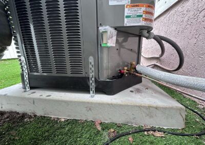 Line set and electrical connections at a newly installed AC condenser in Boynton Beach