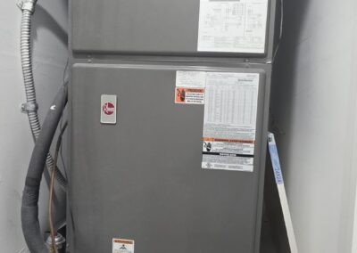 Air handler in a utility closet opened for maintenance in Carriage Pointe, Boynton Beach