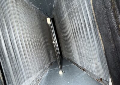 Inside an air handler cabinet showing the blower housing during maintenance in Valencia Isles, Boynton Beach