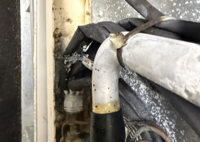 Refrigerant line set and drain connections at an air handler in Valencia Isles, Boynton Beach