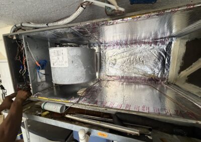 Horizontal air handler opened up with a new foil-faced insulated liner in Buena Vida, Wellington