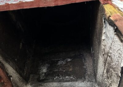 Rotted plywood return box under an air handler before repair in Millpond, Boca Raton