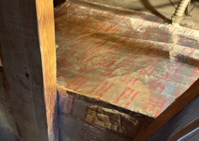 Insulated duct board plenum sealed with foil tape on an attic air handler in Lake Worth