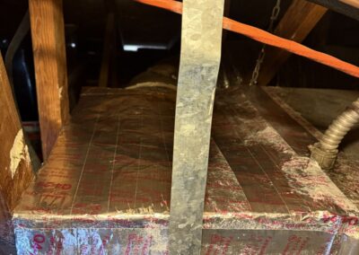 Attic air handler hung on chains with a newly built insulated supply plenum in Lake Worth