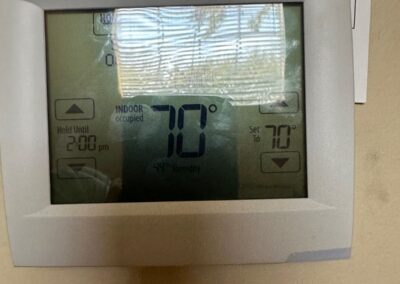 Clubhouse thermostat reading 70 degrees after an AC system check in Boynton Beach