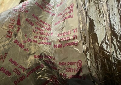 Duct-board fitting wrapped with UL 181 foil tape in an attic in Canyon Trails, Boynton Beach