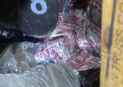 Flex duct connections at a foil-taped duct-board trunk in an attic in Boynton Beach