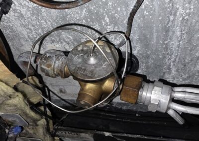 Refrigerant line set and drain connections at an air handler cabinet in Boynton Beach