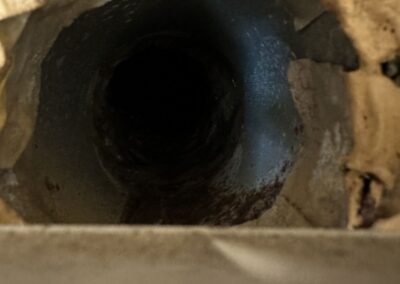 Looking into a supply air duct during an inspection of a newly installed AC system in Boynton Beach